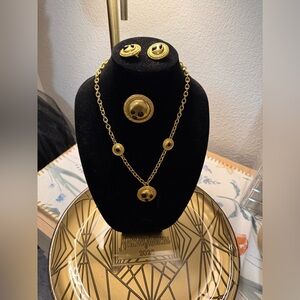 Elegant Gold Jewelry Set with Black Accents
